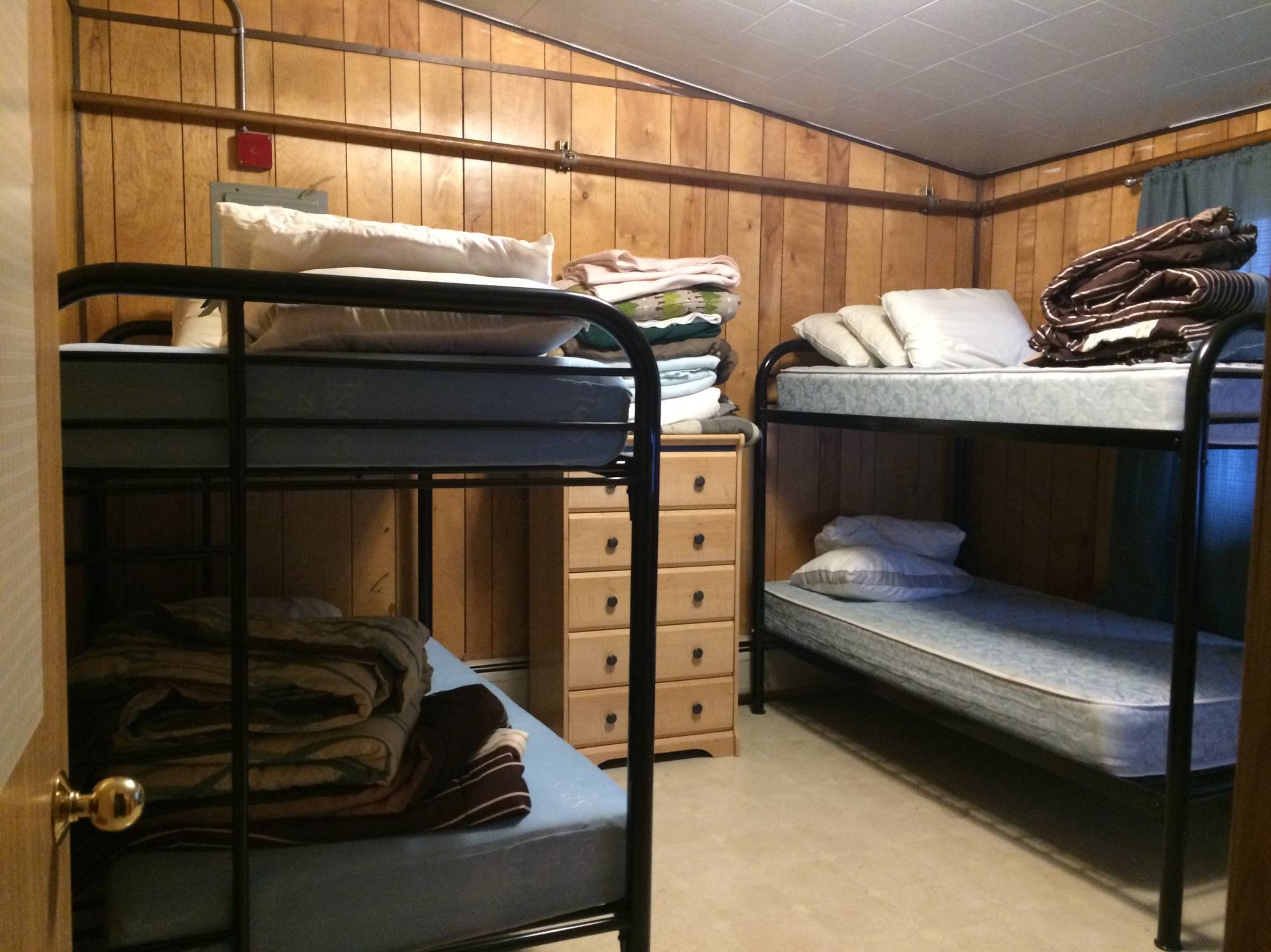 Bedroom in Atqasuk house with two bunk beds.